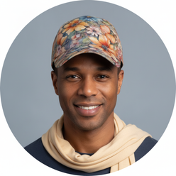 Circular portrait of Oliver Rhodes, a man with a friendly expression, wearing an AQUAREN Watercolor Floral Baseball Cap.